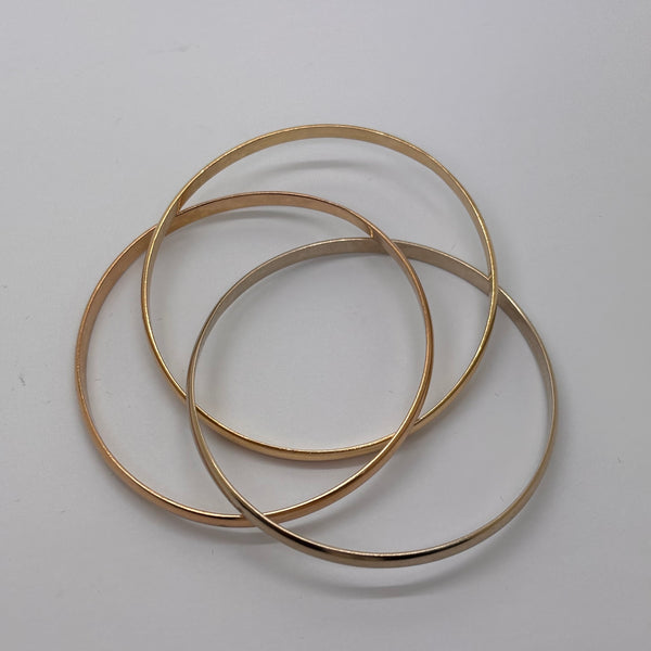 Bracelet jonc en Or Jaune, Or Blanc, Or Rose 18 Carats  ,Poids -37.74 Grs