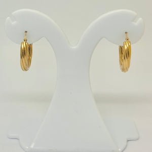 Boucles d'oreilles créoles en or jaune 18K