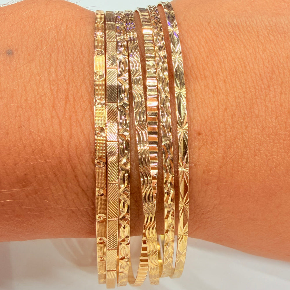 Bracelet semainier 7 joncs en or jaune 18 K