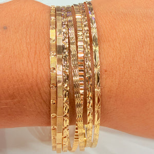 Bracelet semainier 7 joncs en or jaune 18 K