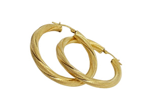 Boucles d'oreilles créoles en or jaune 18