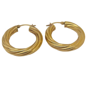 Boucles d'oreilles créoles en or jaune 18K