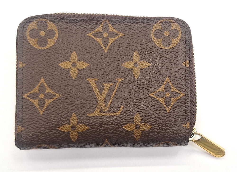 Porte-monnaie Louis Vuitton Zippy en toile monogramme marron