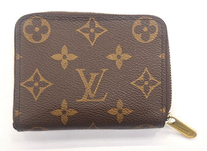 Porte-monnaie Louis Vuitton Zippy en toile monogramme marron