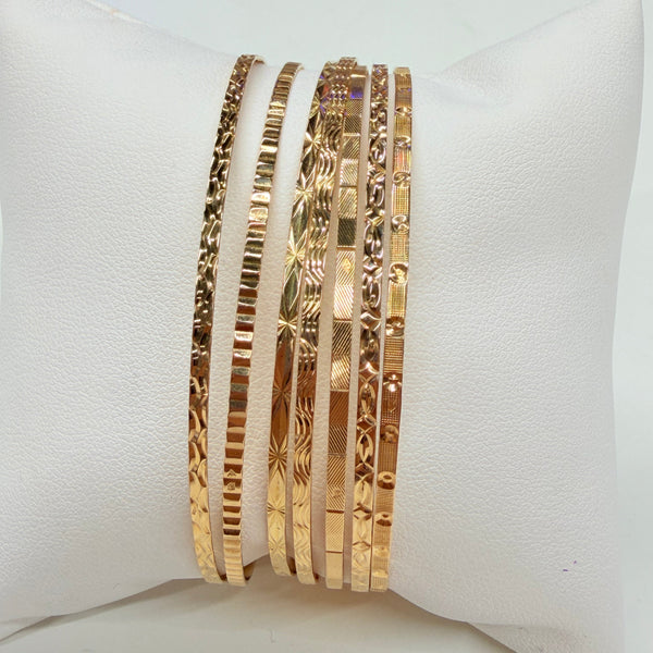 Bracelet semainier 7 joncs en or jaune 18 K