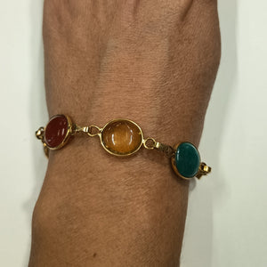 Bracelet en or avec 7 pierres naturelles