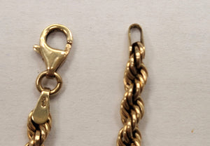 Bracelet en Or jaune 18K torsadé Lg18cm