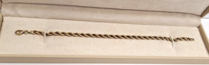 Bracelet en Or jaune 18K torsadé Lg18cm