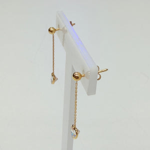 Boucle d'oreille en or jaune 18k avec zirconium