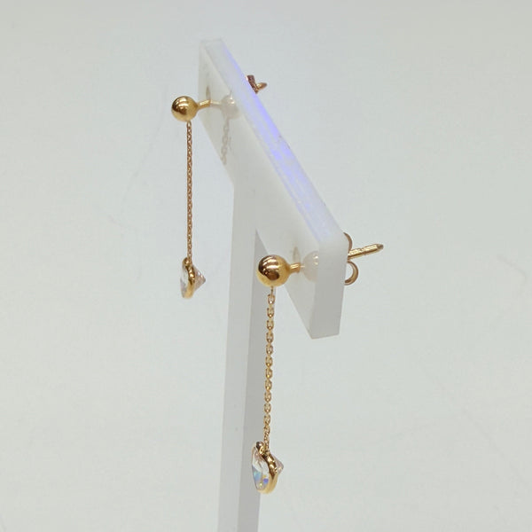 Boucle d'oreille en or jaune 18k avec zirconium