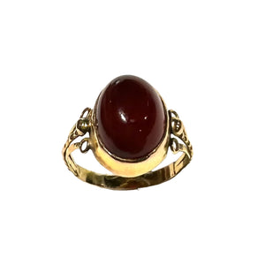 Bague en or jaune 18 carats sertie d'un grenat