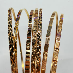 Bracelet semainier 7 joncs en or jaune 18 K