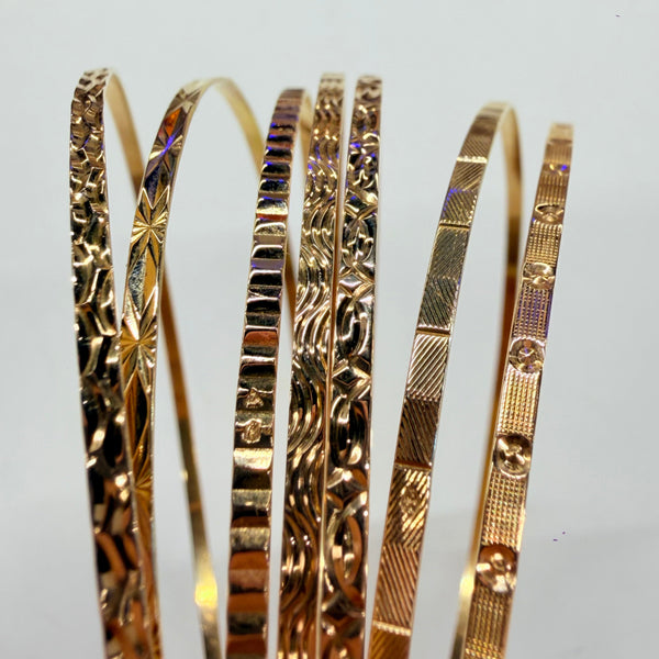 Bracelet semainier 7 joncs en or jaune 18 K