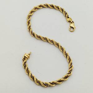 Bracelet maillon torsadé en or jaune et blanc 18 K