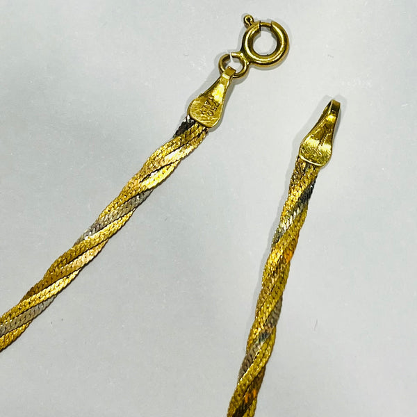 Bracelet trois or 18 carats en maillon tressé