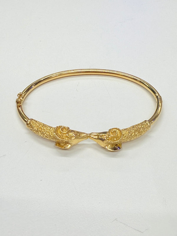 Jonc en Or jaune 18k avec têtes de bélier