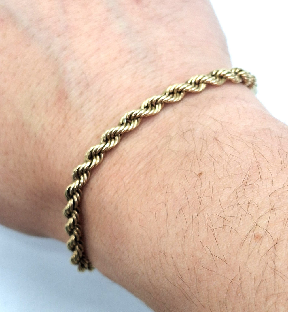 Bracelet en Or jaune 18K torsadé Lg18cm
