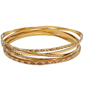 Bracelet semainier 7 joncs en or jaune 18 K