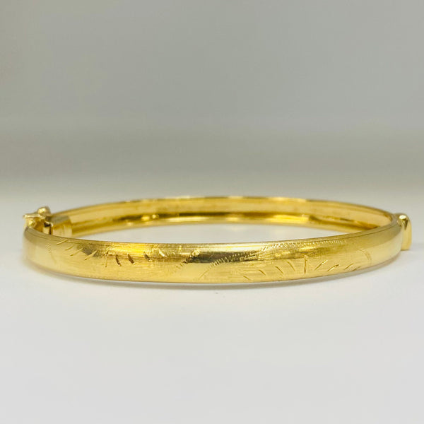 Jonc travaillée en Or jaune 18K Tête d'aigle