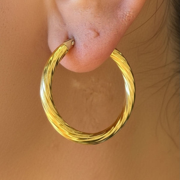 Créoles en Or jaune  18 k avec fermoir cliquets