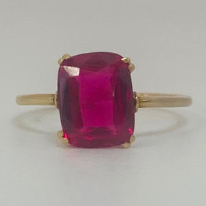 Bague or avec pierre rose