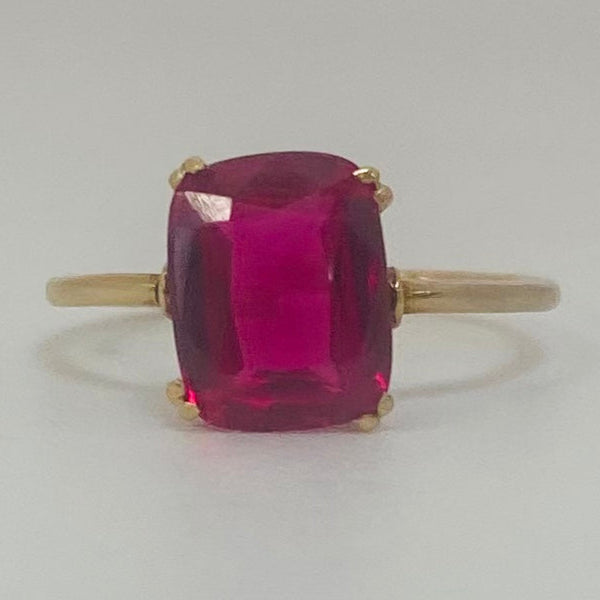 Bague or avec pierre rose