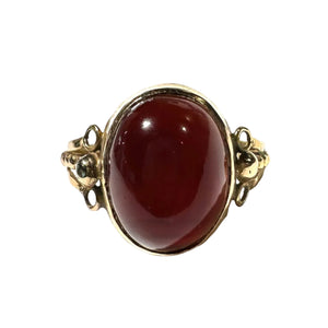 Bague en or jaune 18 carats sertie d'un grenat