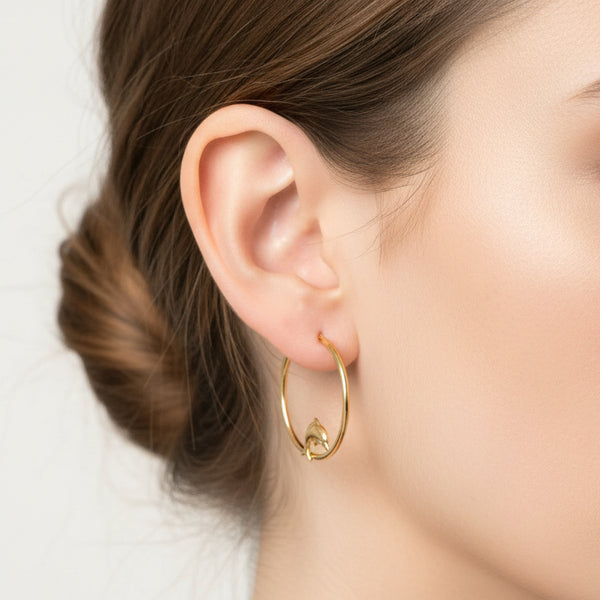 Boucles d'oreilles créoles en or jaune 18 K - 0.84 G
