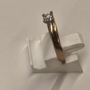 Solitaire en Or Blanc et Jaune 18K avec un diamant 0.14K - T52