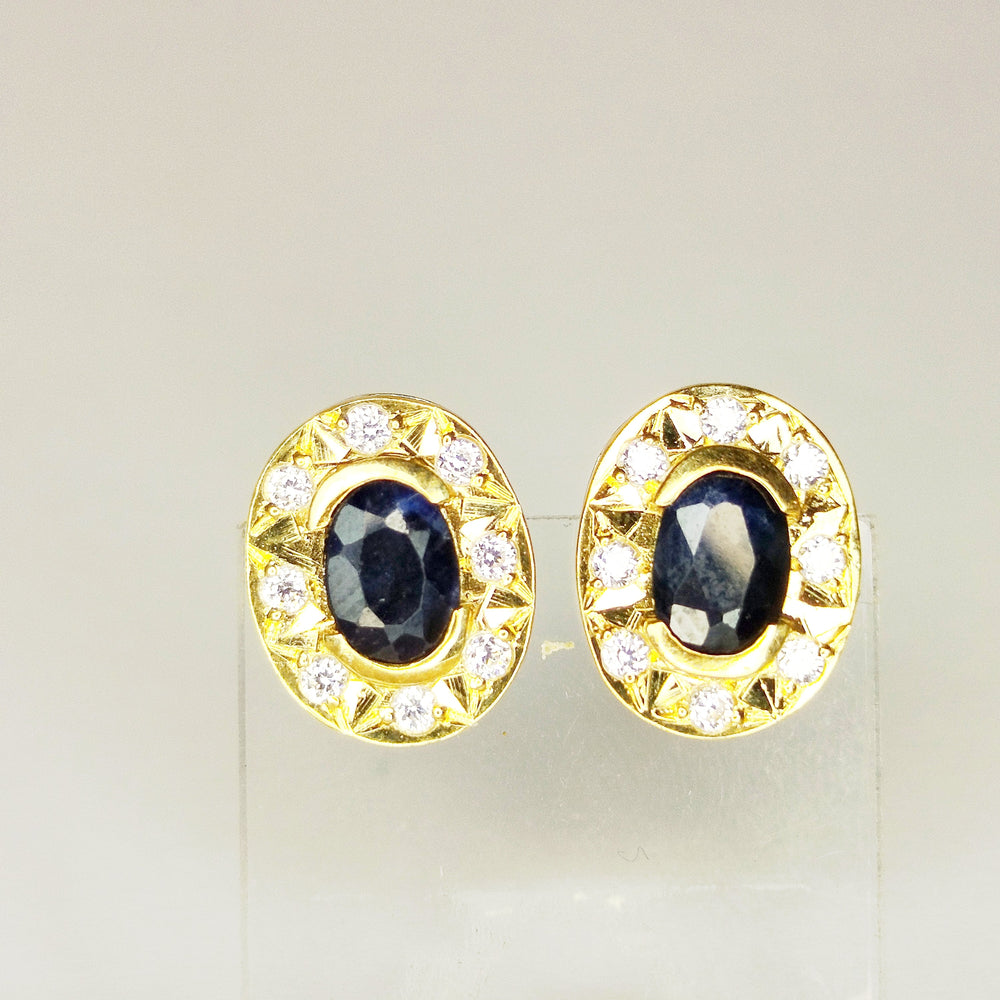 Boucles d'oreilles clou en or jaune 18k avec zircone - 1.75 Grs