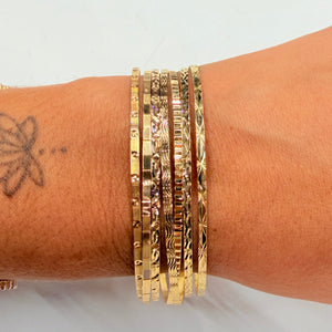 Bracelet semainier 7 joncs en or jaune 18 K