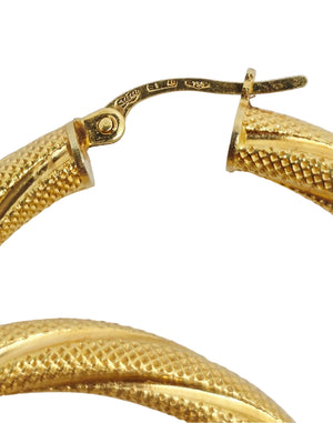 Boucles d'oreilles créoles en or jaune 18