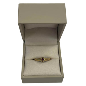 Bague en Or Jaune 18k avec pierre rouge
