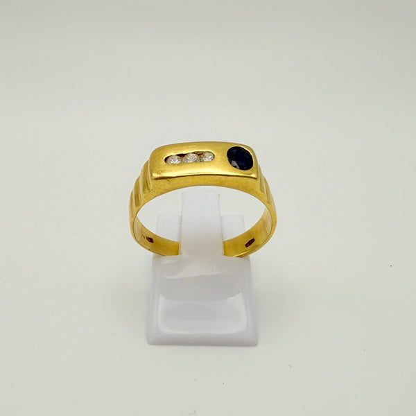 Bague en or jaune 18 K avec diamants et saphir - T 58
