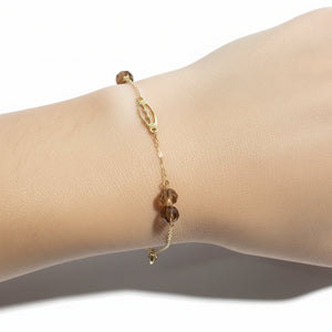 Bracelet station or jaune 18 carats, motifs ajourés