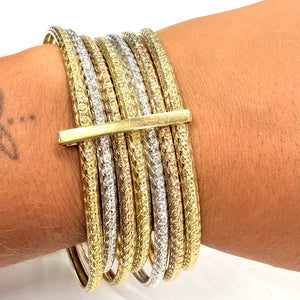 Bracelet Semainier 7 joncs en 3 ors 18 carats - 57.92 Grs