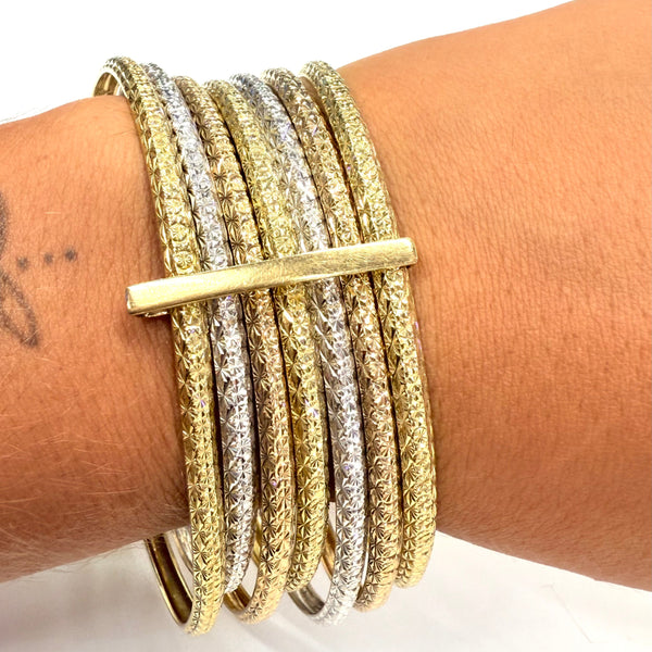 Bracelet Semainier 7 joncs en 3 ors 18 carats - 57.92 Grs