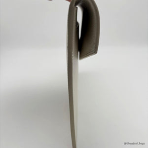 Pochette Saint Laurent Uptown en cuir grain de poudre blanc