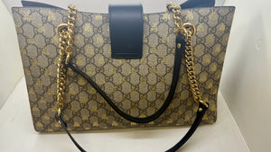Sac à main Gucci Padlock – Toile siglée beige et cuir noir