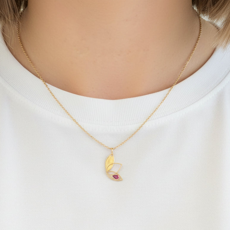 Pendentif fantaisie en or jaune avec pierre rouge 18K - 0.60 G