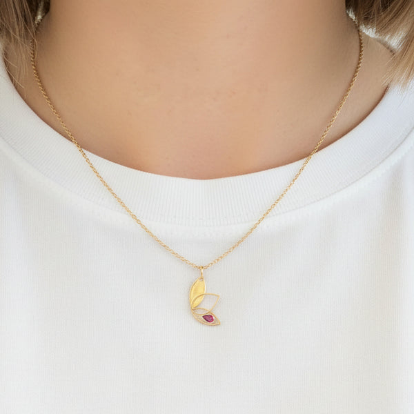 Pendentif fantaisie en or jaune avec pierre rouge 18K - 0.60 G