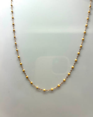 Collier ras du cou perles résine beige or 18 carats