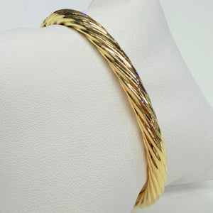 Bracelet jonc torsadé en or jaune 18 K