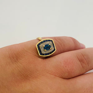Bague or avec diamants et saphirs