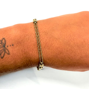 Bracelet en or 18k torsadé et maille anglaise
