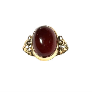 Bague en or jaune 18 carats sertie d'un grenat