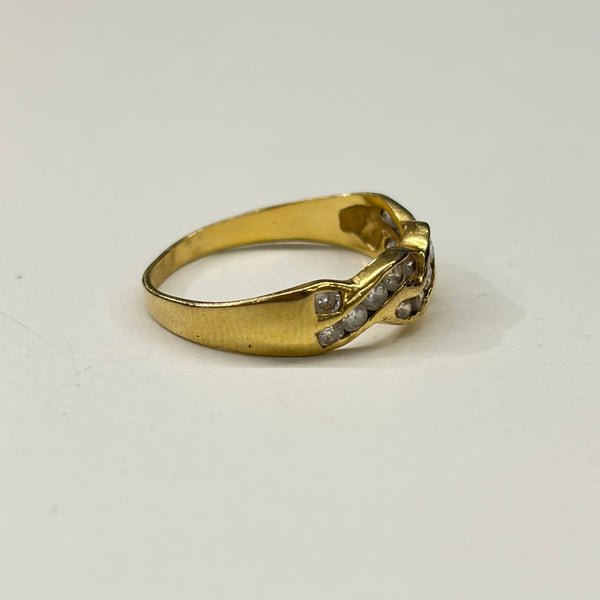 Bague en or jaune avec zirconiums 18 K
