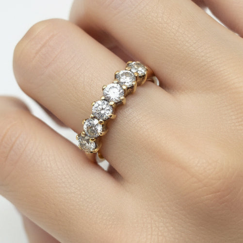 Bague Demi Tour Or Jaune 18k avec 7 oxydes de zirconium