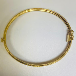 Jonc travaillée en Or jaune 18K Tête d'aigle