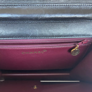 Sac à main Chanel Single Flap en cuir noir